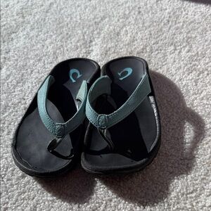 OluKai Kids Black and Teal Flip Flops